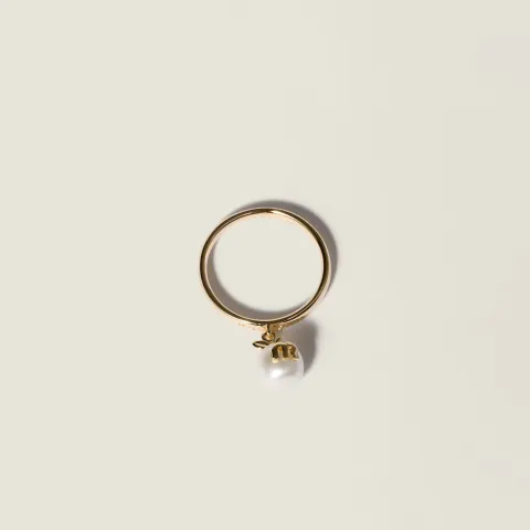 Metal ring with pendant