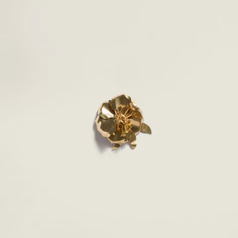 Metal brooch with crystals
