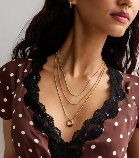 Gold Tone Triple Layer Oval Pendant Necklace