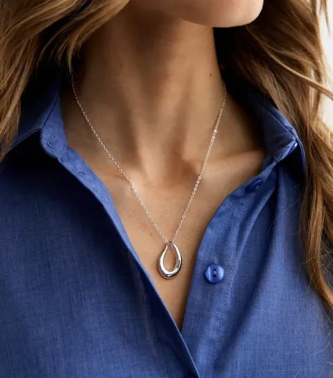 Silver Tone Abstract Oval Pendant Necklace
