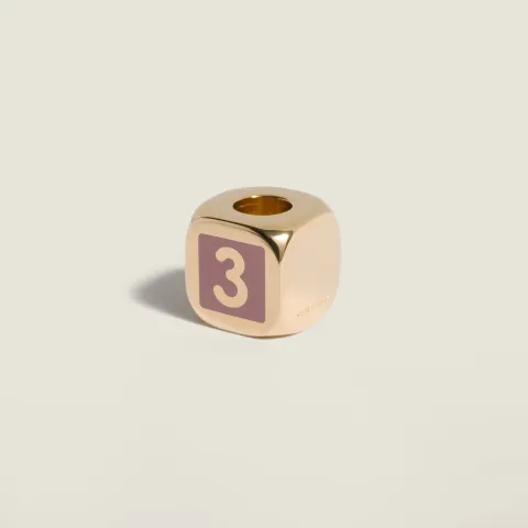 Enameled metal dice charm