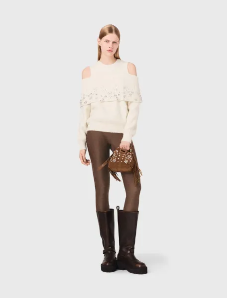 Off-the-shoulder jumper with jewellery