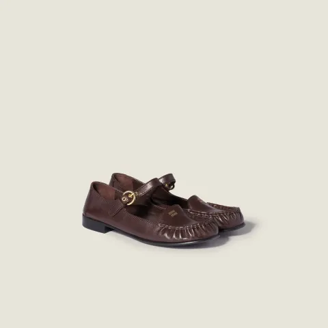 Leather loafers with strap