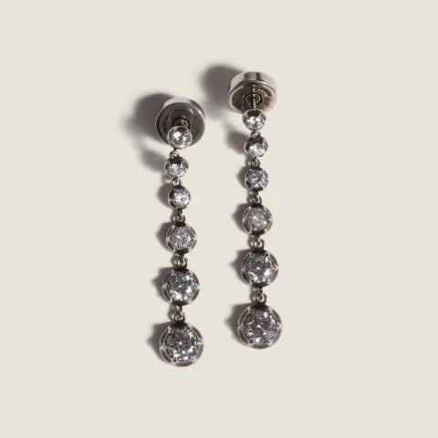 Metal pendant earrings with crystals
