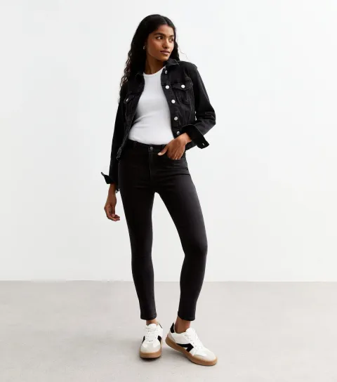 Women's Petite Washed Black Mid Rise Slim Jeans