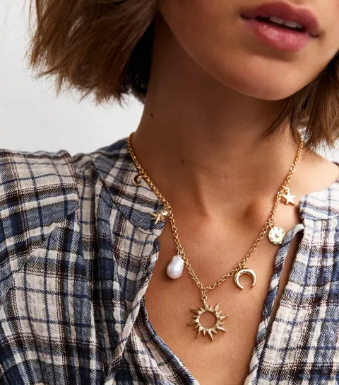 Gold Tone Mystical Charm Necklace