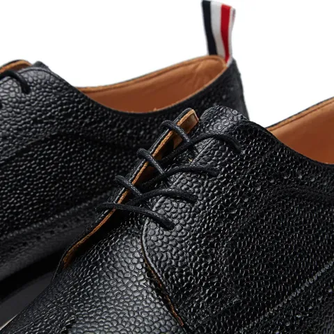 Split Welt Sole Wingtip Brogue