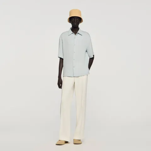 Pleated shirt with shark collar