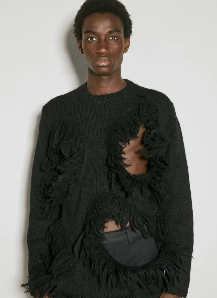 Cut-Out Wool Sweater With Tassle Edge