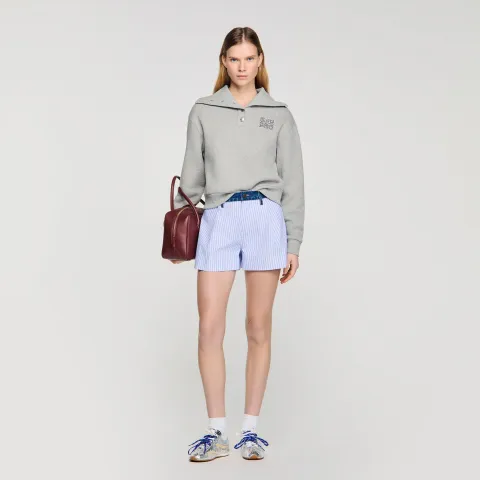 Embroidered split neck sweatshirt