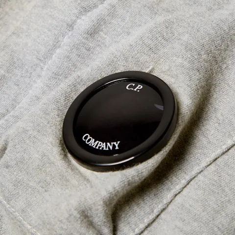 Arm Lens Track Top