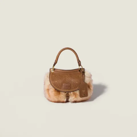 Rendez-vous shearling and nappa leather bag with metal studs