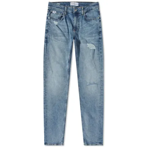 Distressed Medium Wash Slim Taper Jeans