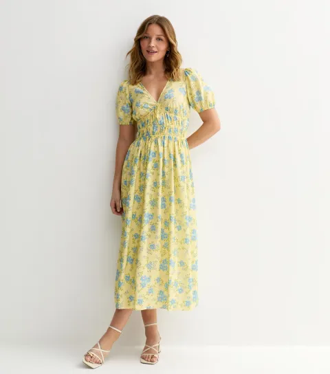 Women's Yellow Crepe Ditsy Print Tiered Hem Midi Dress