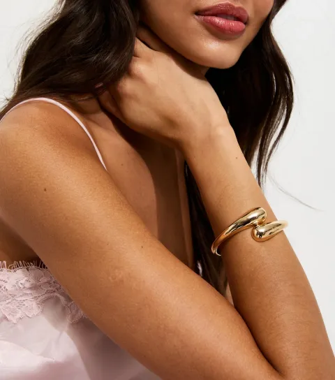 Gold Tone Teardrop Hinge Bangle