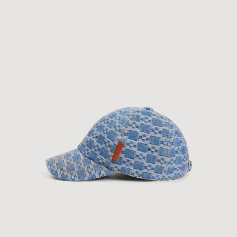 Denim cap with cross motif