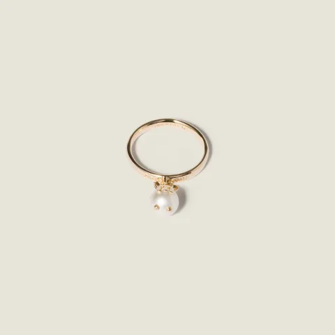 Metal ring with pendant