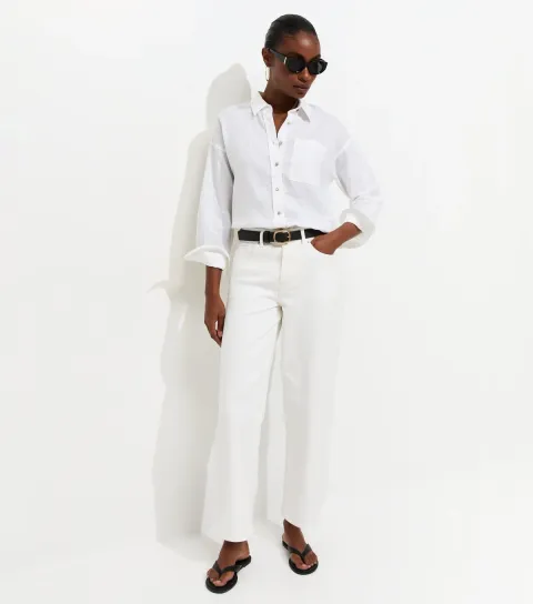 Women's Off White Denim Cropped Tapered Ankle Grazer Barrel Leg Jeans