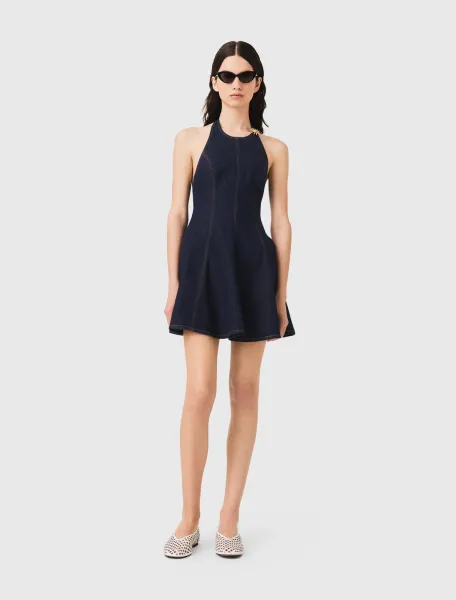 Short denim dress with brooch