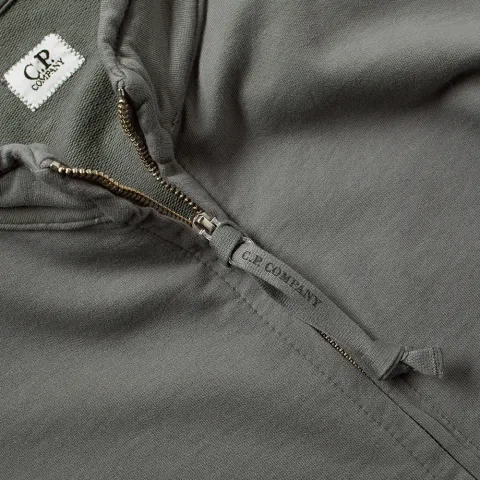 Arm Lens Track Top