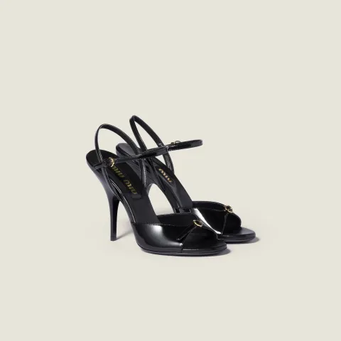 Patent leather sandals with buckles