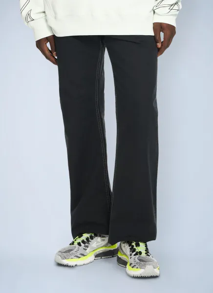Half Arrow Slim Relaxed Pants
