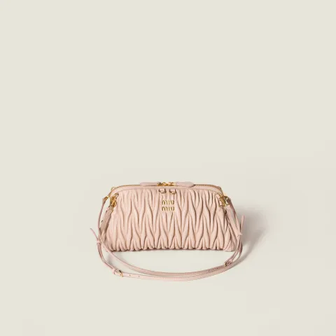 Caprice matelassé nappa leather clutch