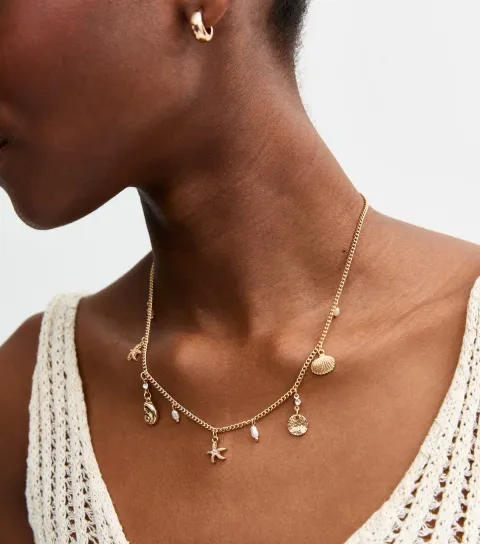 Gold Tone Shell Charm Necklace