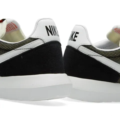 Roshe Daybreak NM