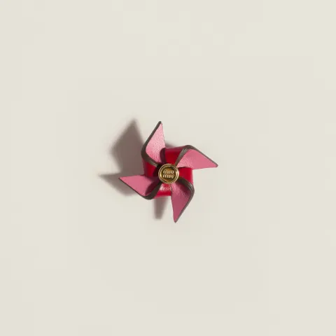 Leather pinwheel brooch