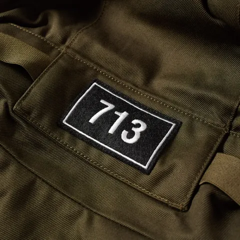 x Travis Scott Debris Patch Hooded Jacket
