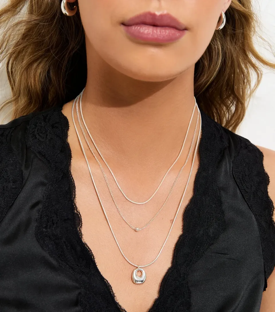 Gold Tone Triple Layer Oval Pendant Necklace