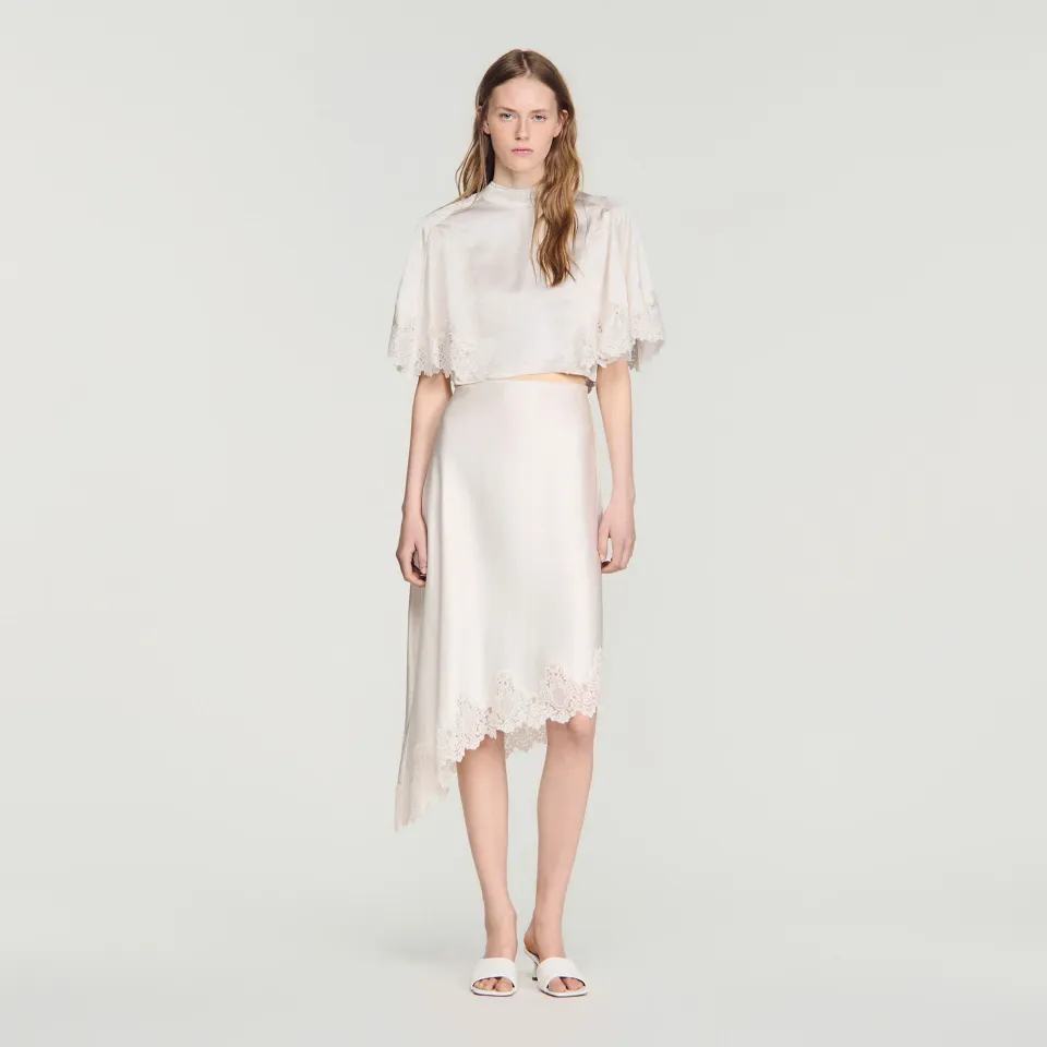 Asymmetrical satin skirt with lace