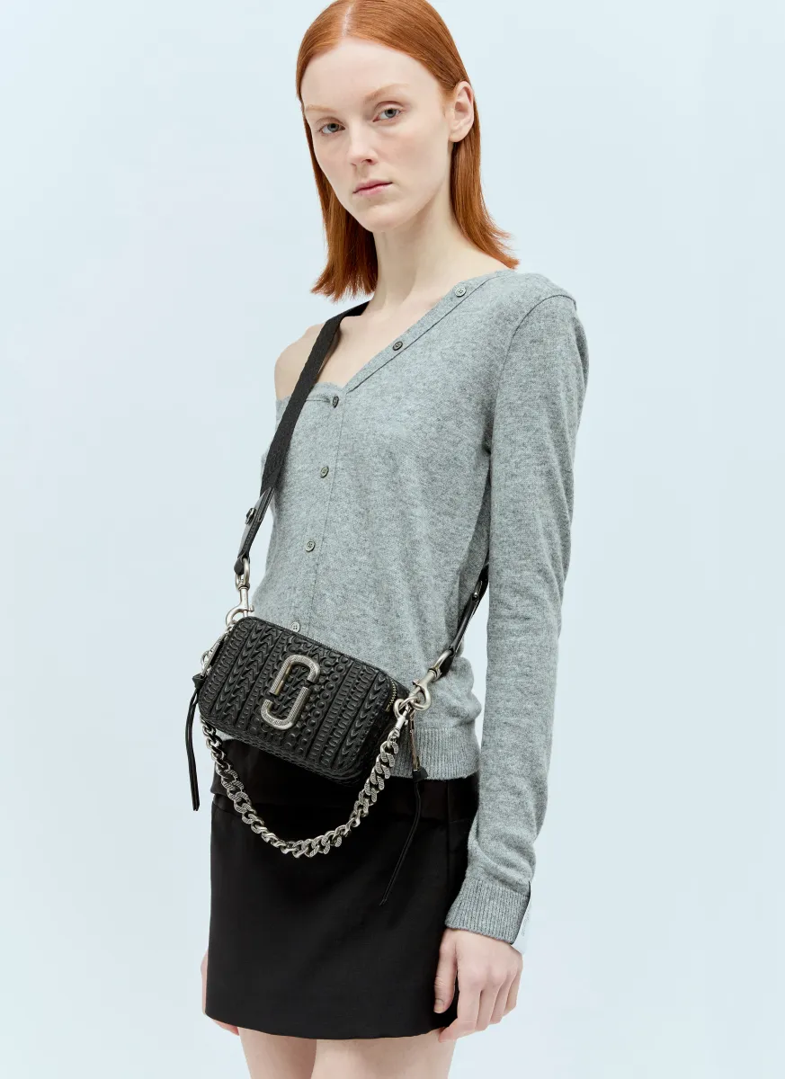 The Monogram Debossed Snapshot Shoulder Bag