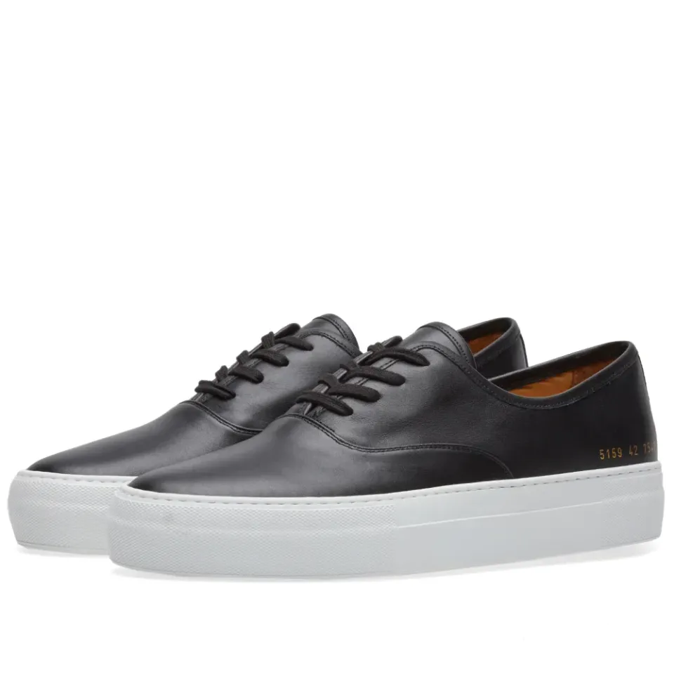 Tournament Four Hole Leather