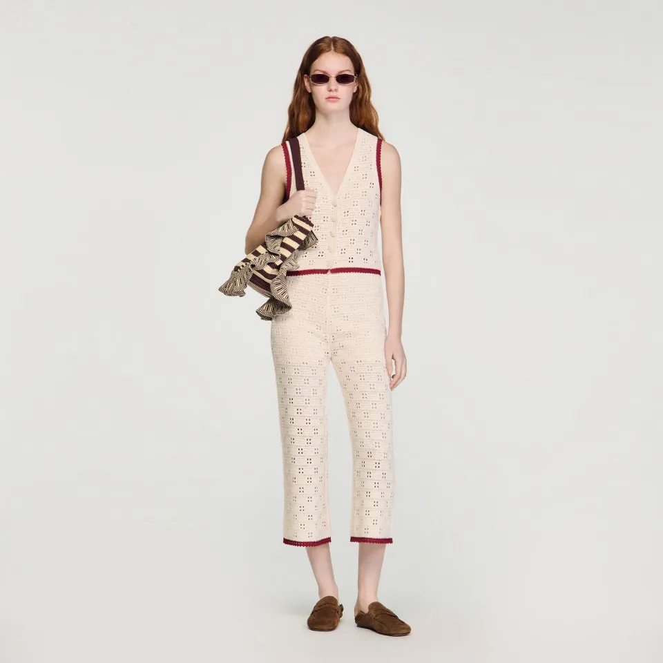 Crochet-look knit trousers