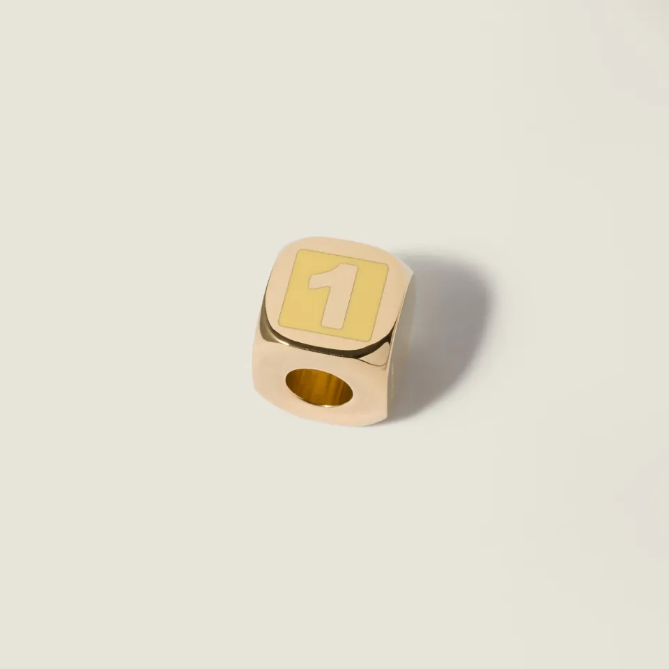 Enameled metal dice charm