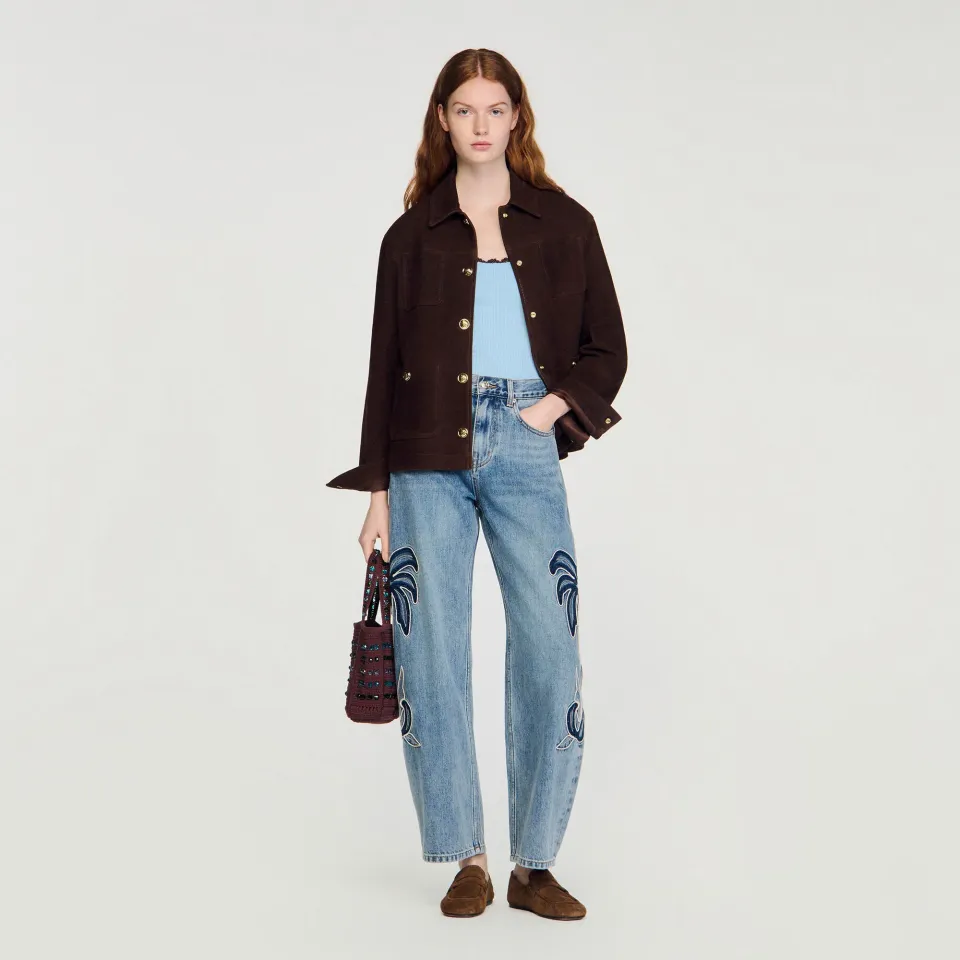 Palm-embroidered wide barrel jeans
