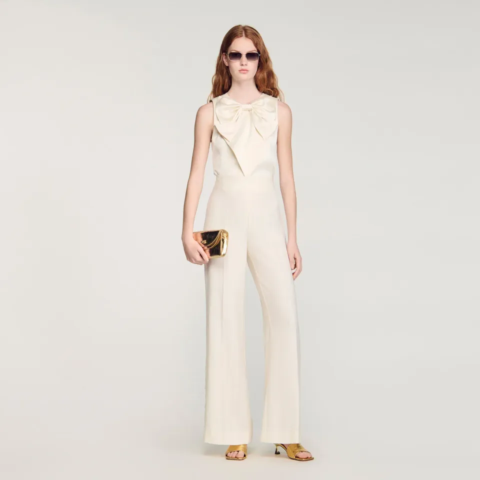 Buttoned-slit straight-leg trousers