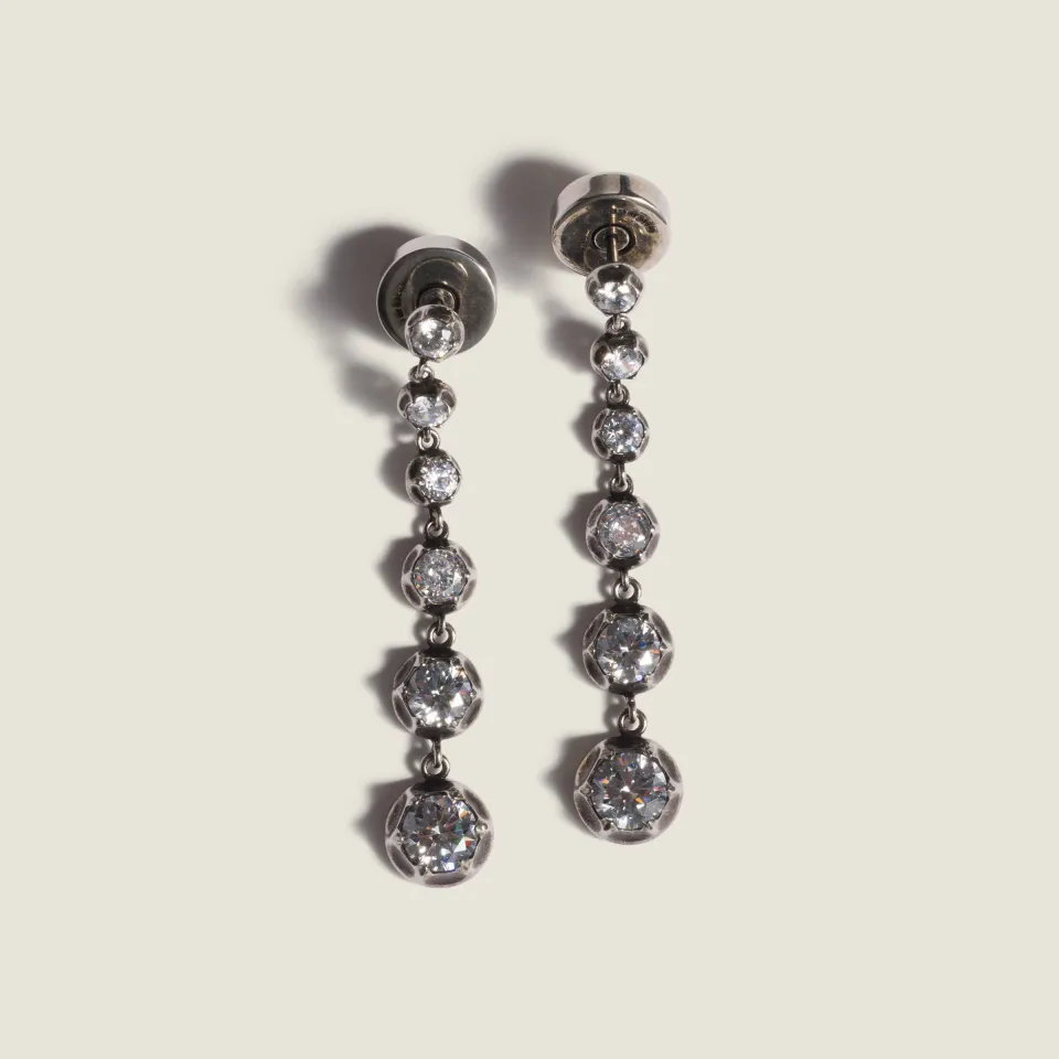Metal pendant earrings with crystals