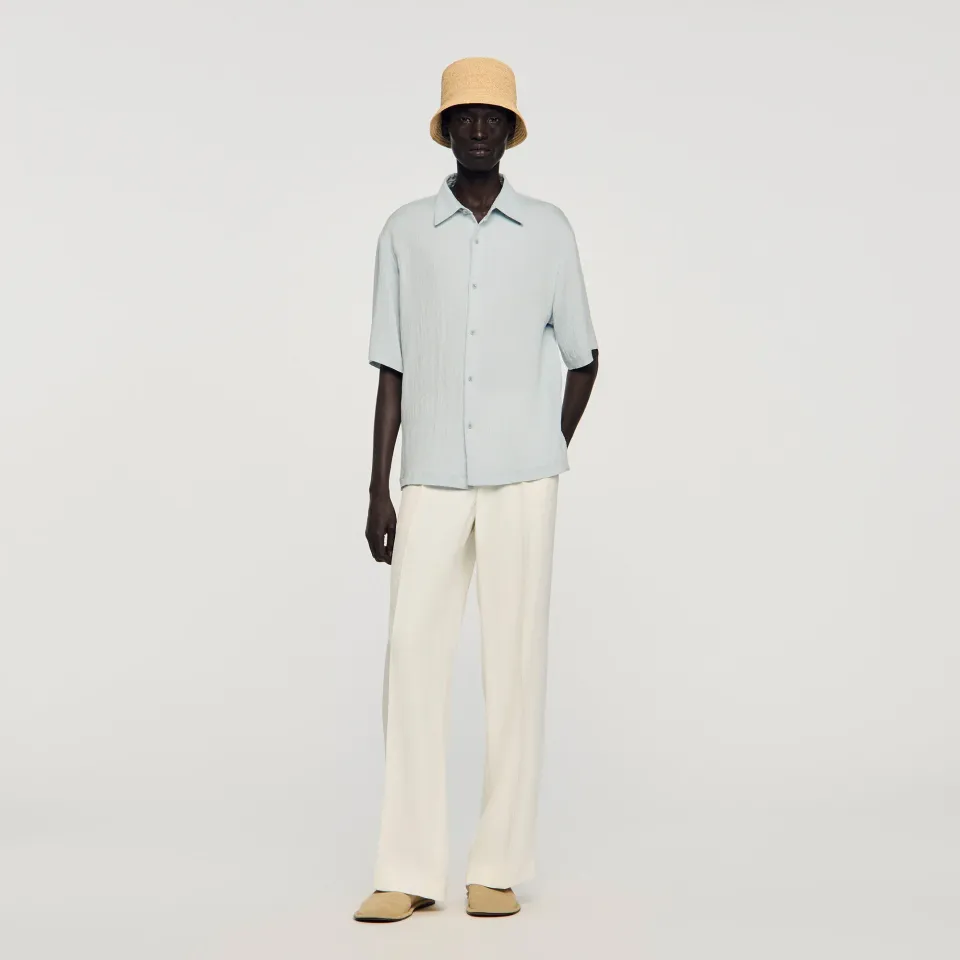 Pleated shirt with shark collar