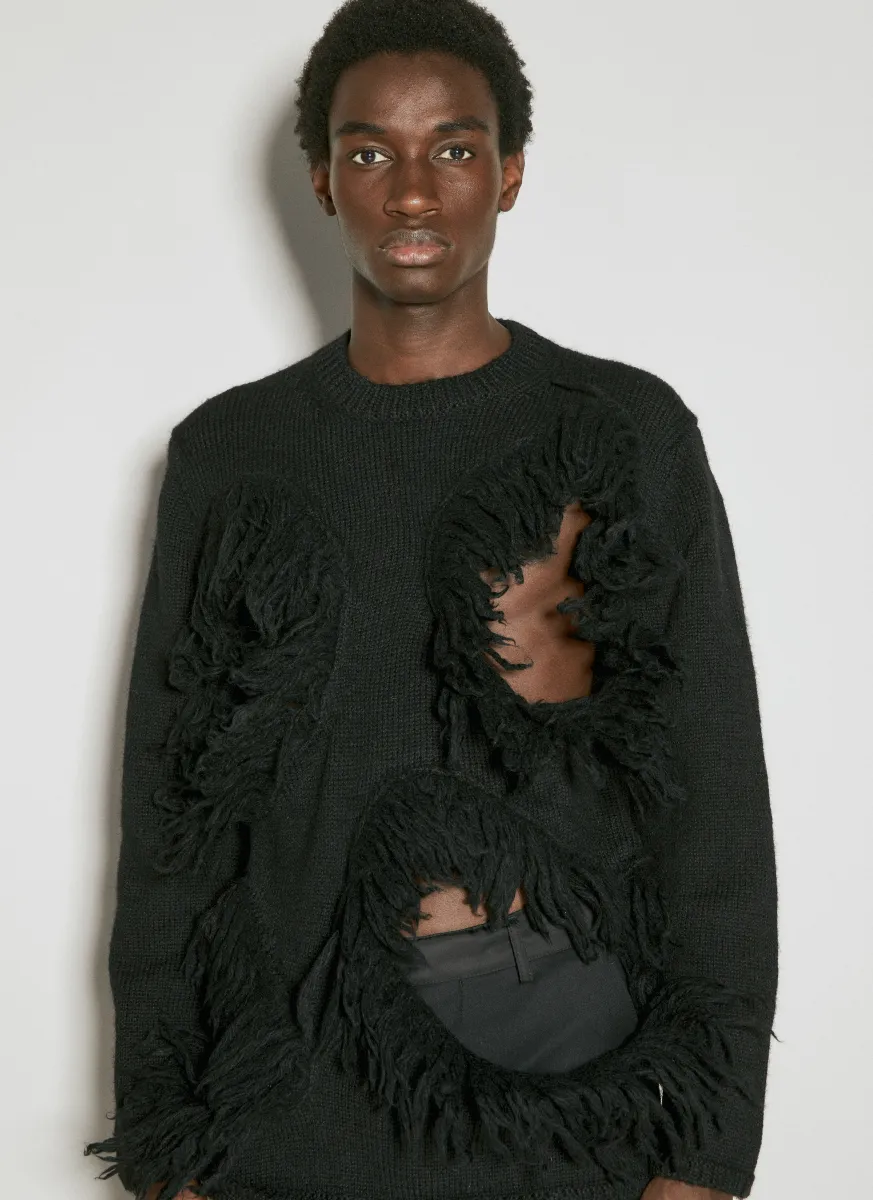 Cut-Out Wool Sweater With Tassle Edge