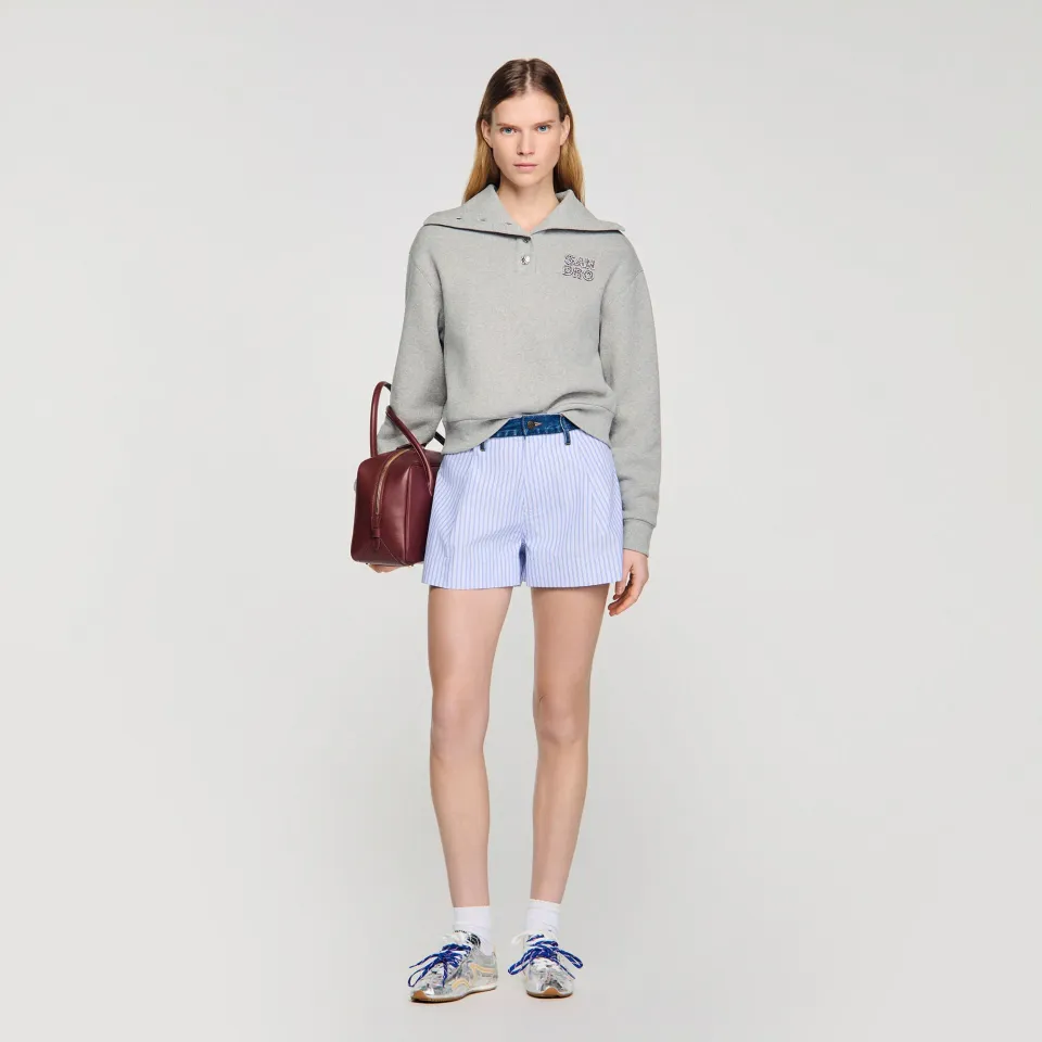 Embroidered split neck sweatshirt