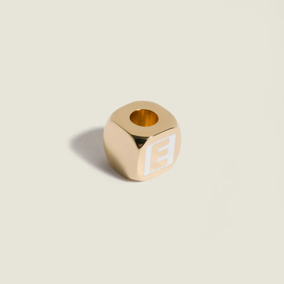 Enameled metal dice charm