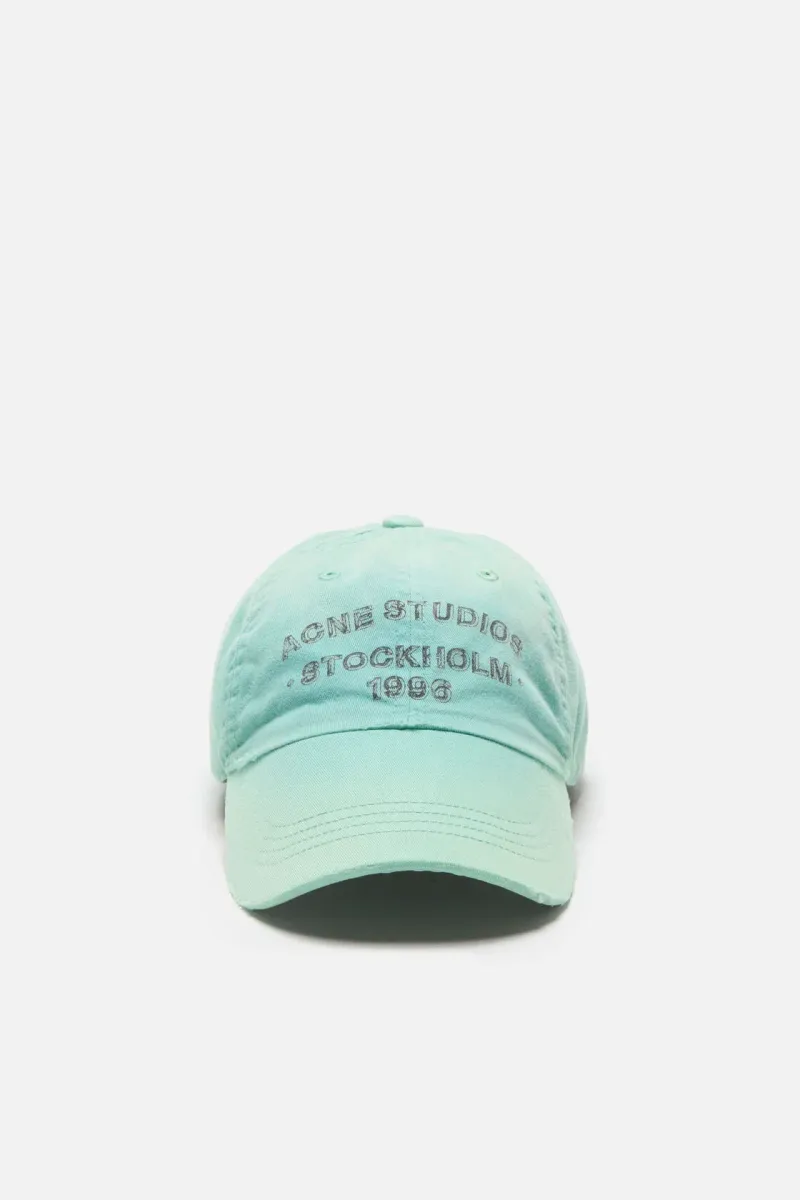 Sprayed logo cap