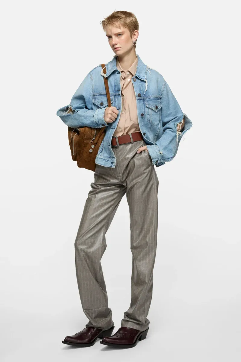 Distressed denim jacket