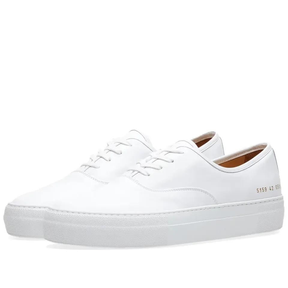 Tournament Four Hole Leather