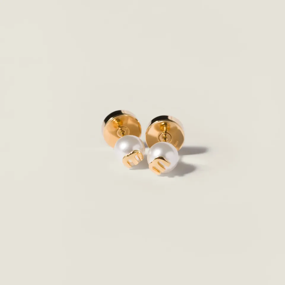 Metal and pearl earrings