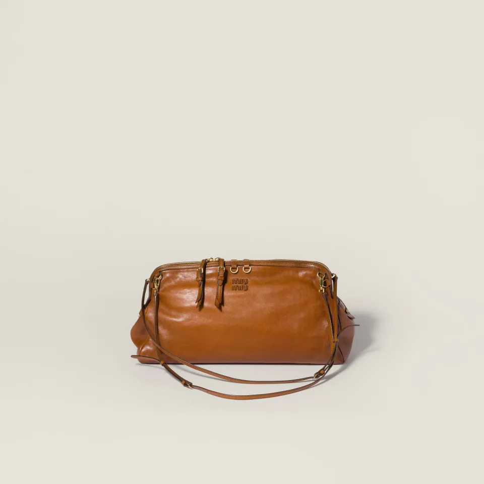 Caprice leather clutch