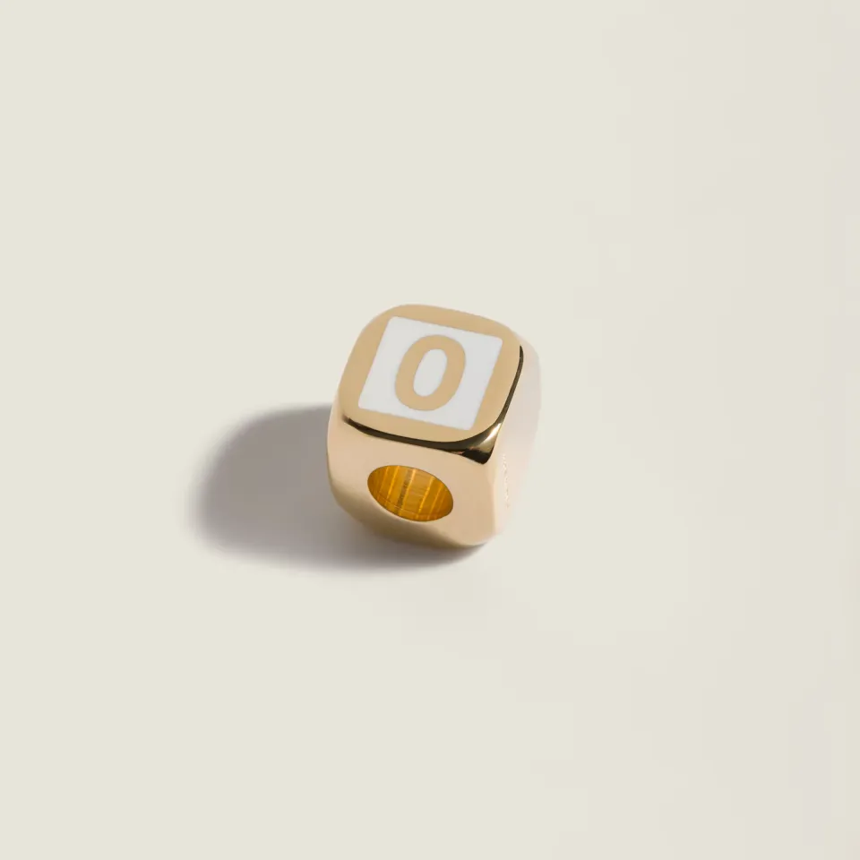 Enameled metal dice charm